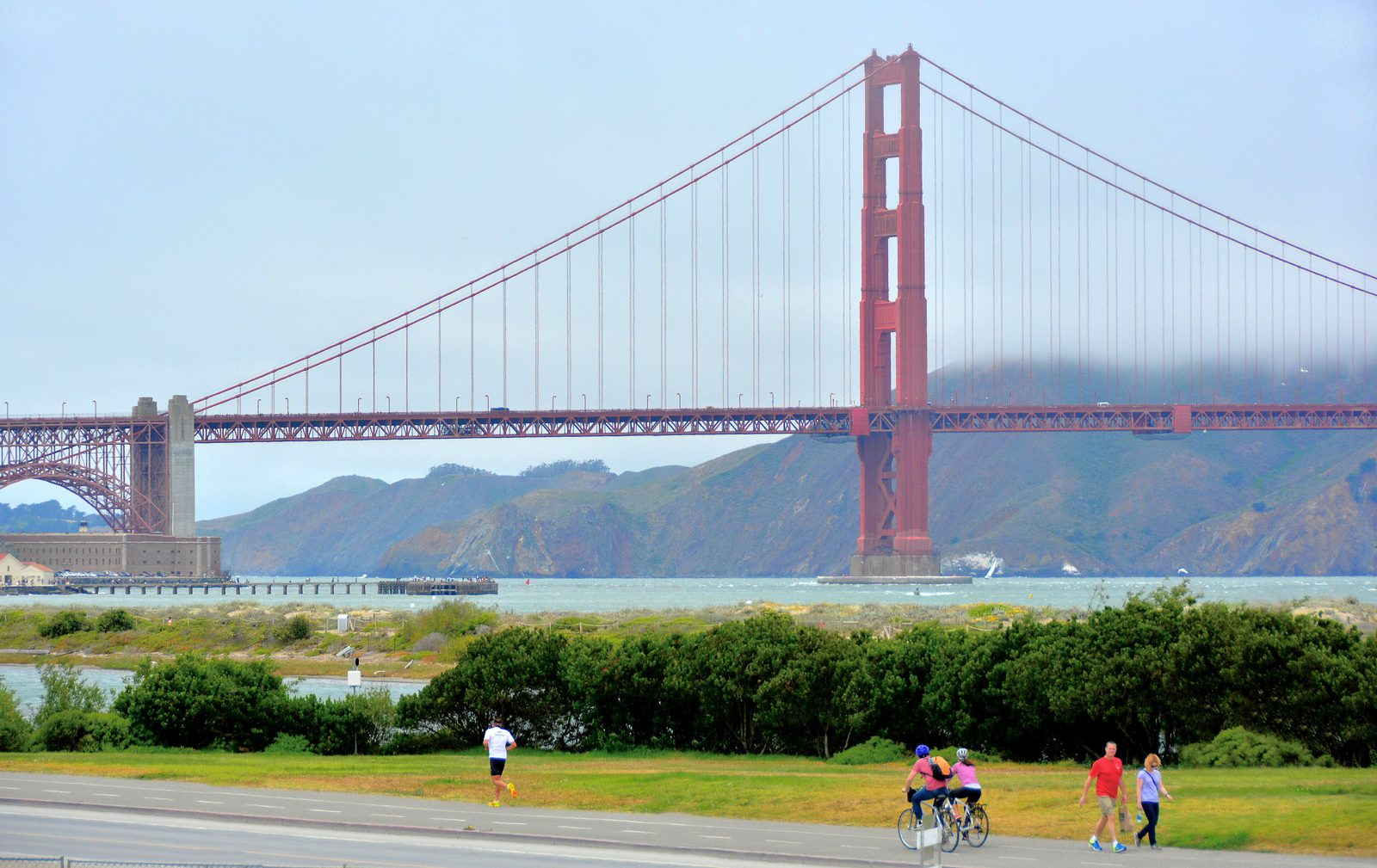 The Golden Gate Bridge seen from Crissy Field in San Francisco, with the bay in front of it